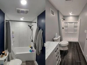 Modern bathroom with walk-in shower, floating vanity, dark flooring, and recessed lighting